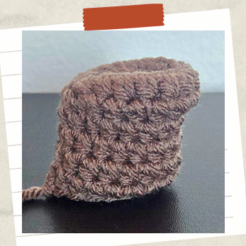 Free crochet pumpkin pattern finished in soft orange plush yarn for fall decorating