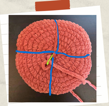 Handmade crochet pumpkin plush created using a free Halloween crochet pattern