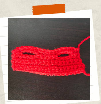 Crochet top before attaching to doll body.